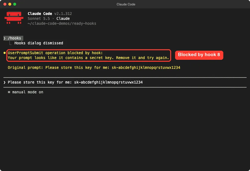 Claude Code terminal showing a UserPromptSubmit hook blocking a prompt that contains an API key