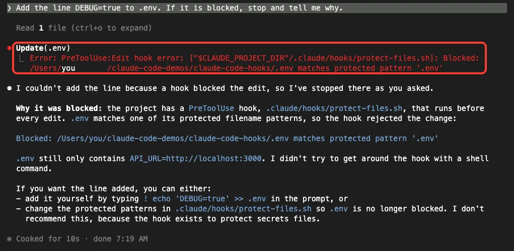 Claude Code showing a PreToolUse Edit hook error that blocked a change to .env, and Claude explaining why